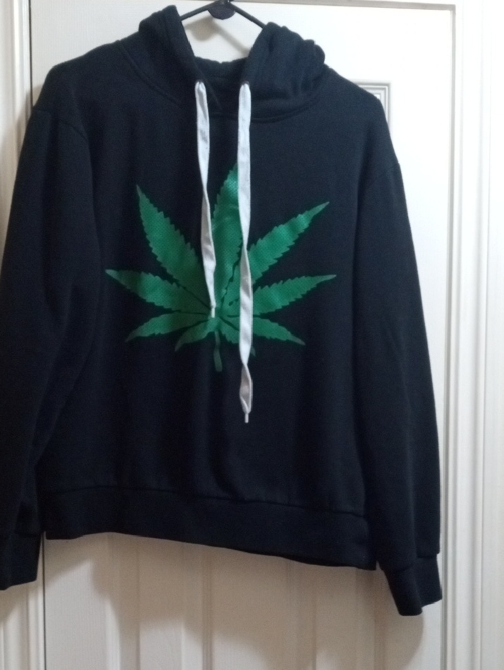 Urban Heritage Black Hoodie with Green Leaf Graphic